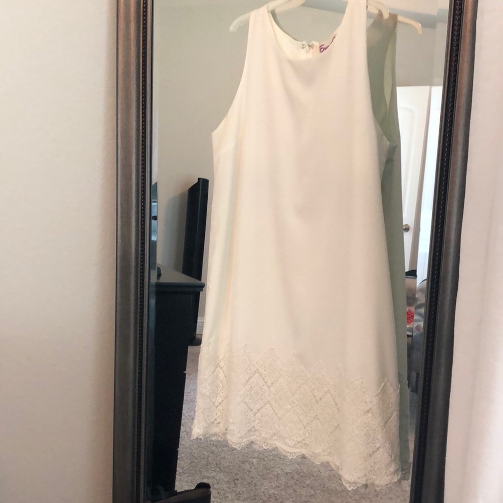 Ivory dress with lace at bottom